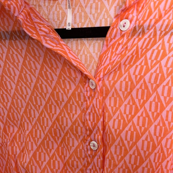 Never worn- Free People button up dress with ties/fabric detail on skirt. - Picture 2 of 4